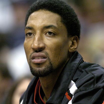 scottie pippen of the chicago bulls sits on the bench during the game between the los angeles clippers and the chicago bulls at the staples center in los angeles, california, on tuesday, january 27, 2004 the clippers defeated the bulls 102 92 photo by kirby leewireimage