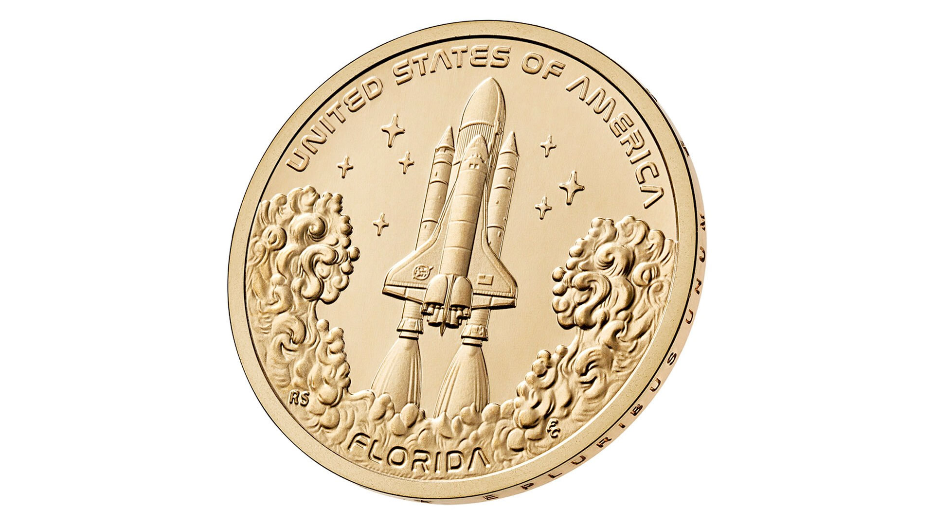 a golden coin depicting a space shuttle lifting off