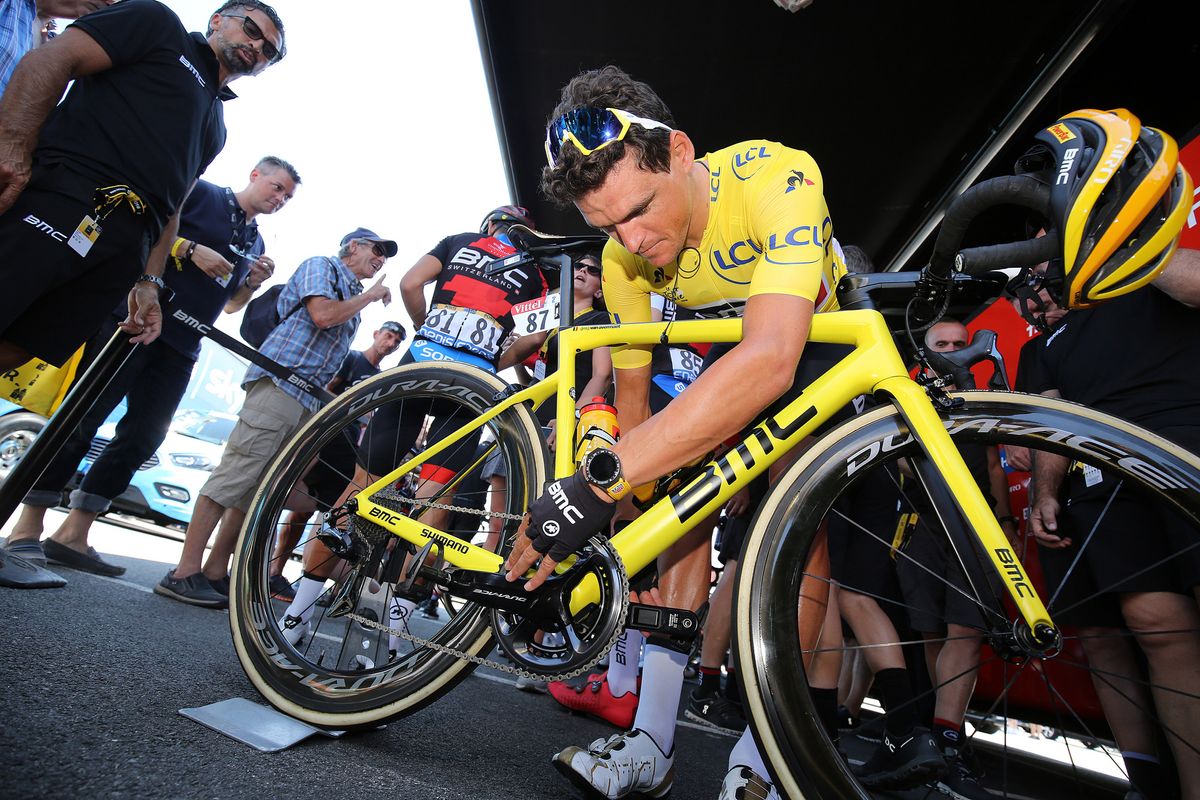 Race leader Greg Van Avermaet adjusts his special yellow BMC