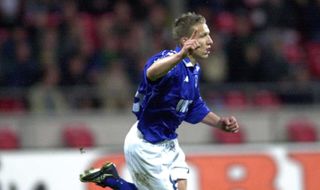 Wesley Sonck celebrates after scoring for Genk against Werder Bremen in October 2000.