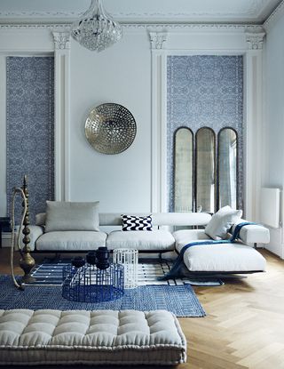 light blue, dark blue and grey transitional style living room