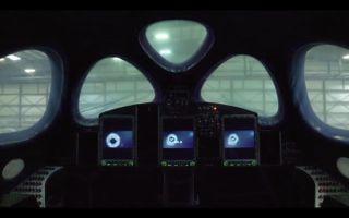 A still from a new video showing the lights coming on inside Virgin Galactic's third SpaceShipTwo vehicle.
