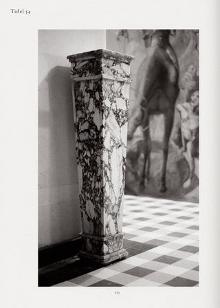 Photography of a plinth in a hallway