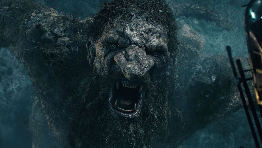 A giant troll lunges at the camera