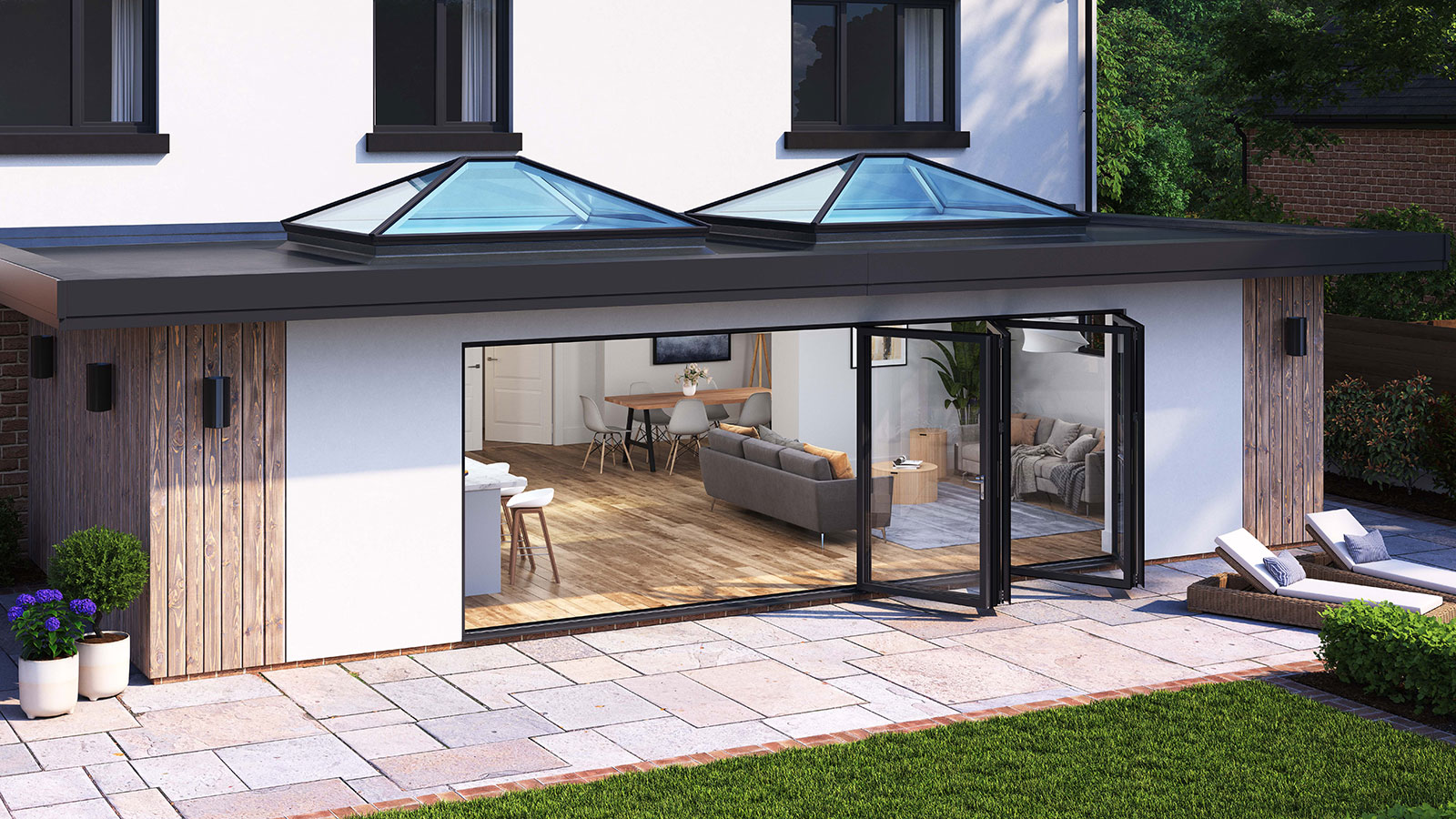 rear extension with two large roof lanterns and modern bifolding doors leading out to a patio area