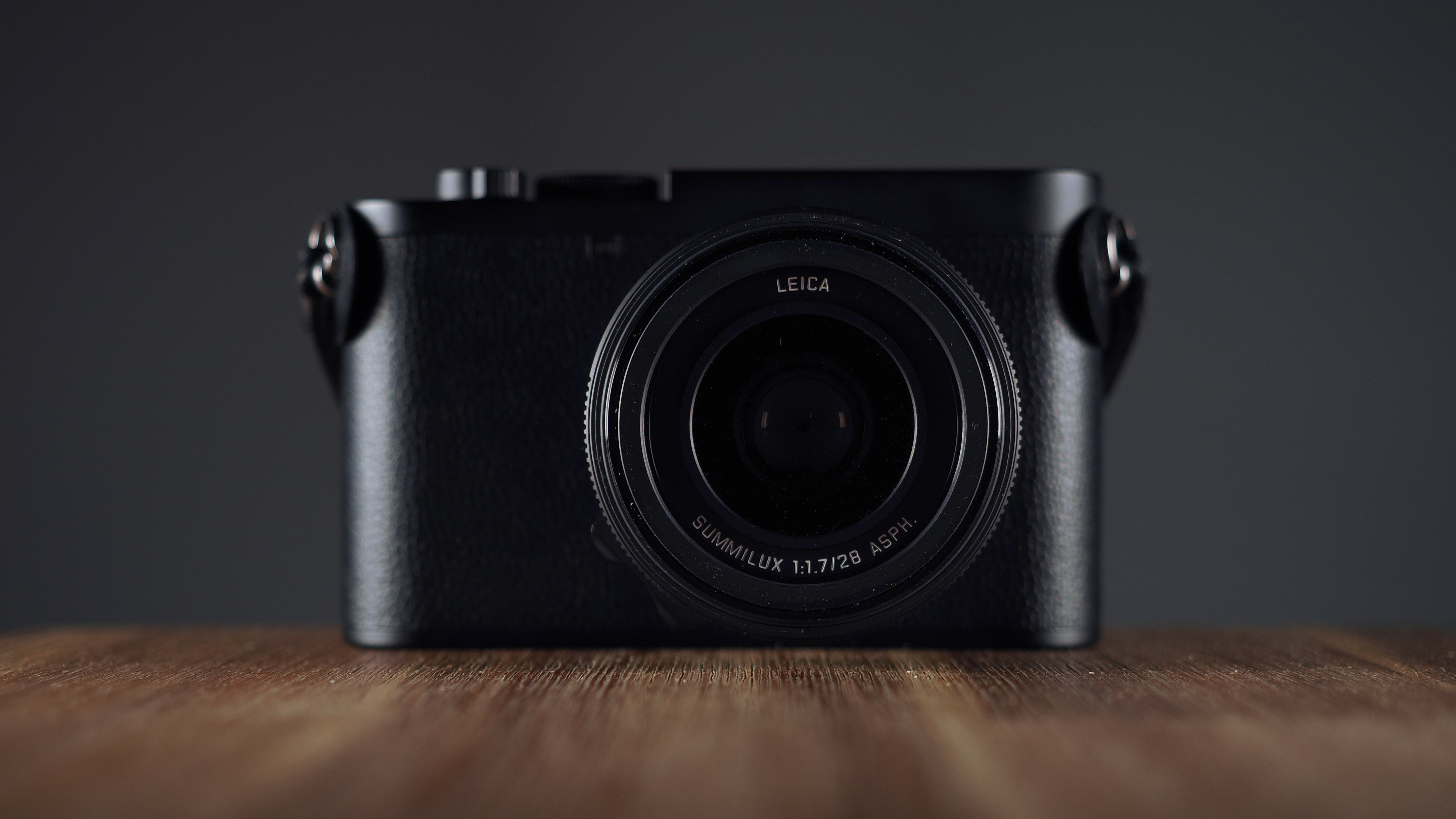 Leica Q3 Monochrom on a wooden surface