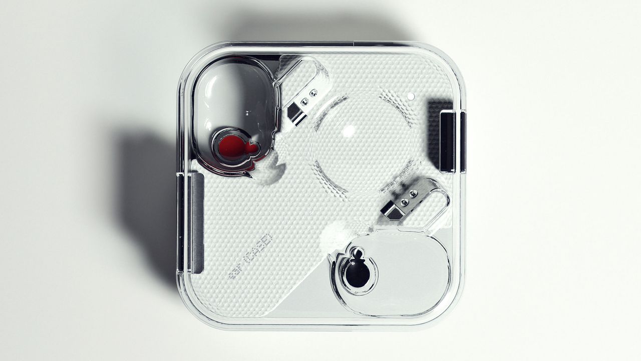 Top-down view of the transparent Nothing Ear 1 charging case with the lid closed