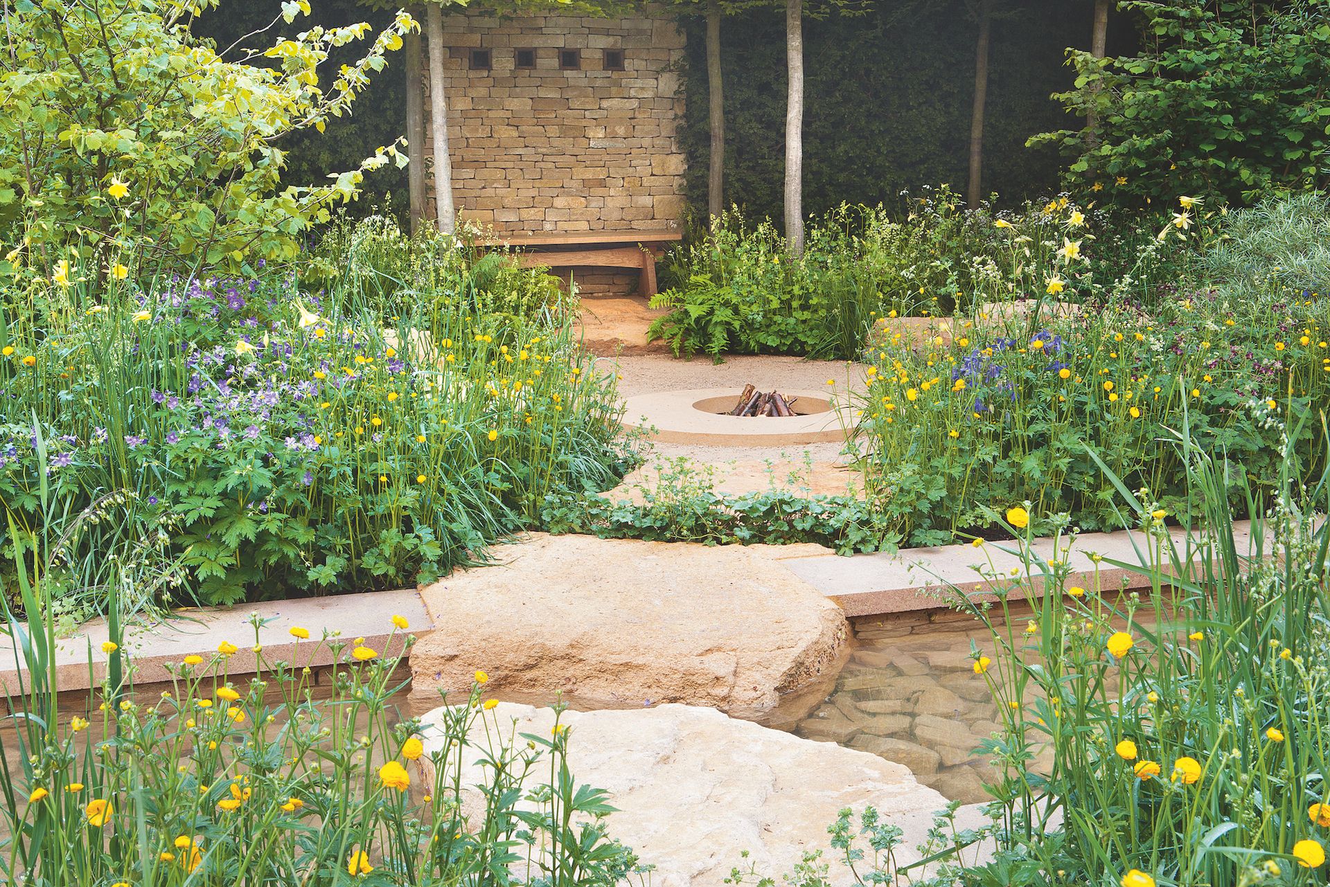 sunken stone fire pit natural look in garden