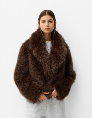 Faux fur jacket with lapel collar