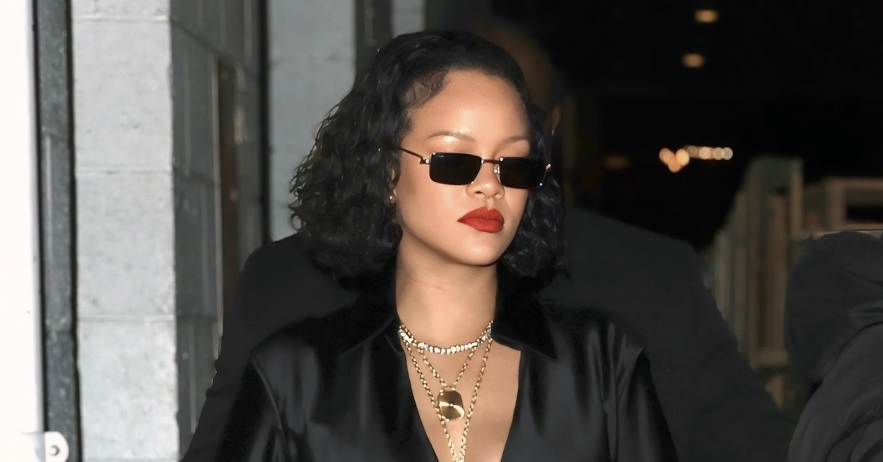 Rihanna wears zip-up leggings and a stain top