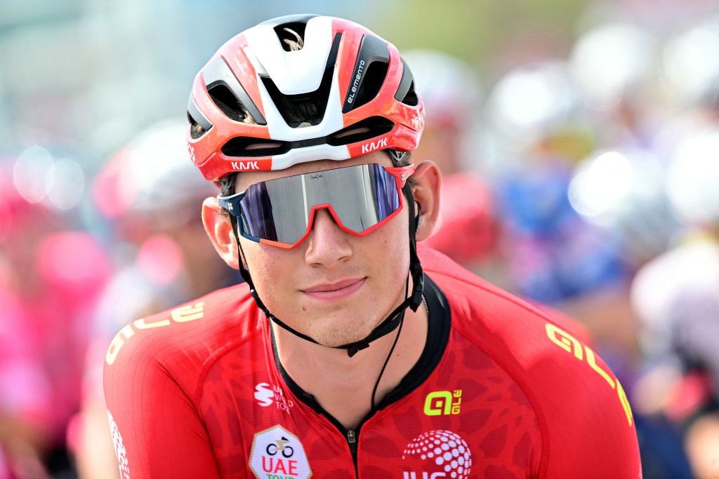 INEOS Grenadiers' British rider Joshua Tarling waits at the start line before the third stage of the UAE Tour cycling race from Ras al Khaimah to Jebel Jais in the United Arab Emirates, on February 19, 2025. (Photo by Giuseppe CACACE / AFP)