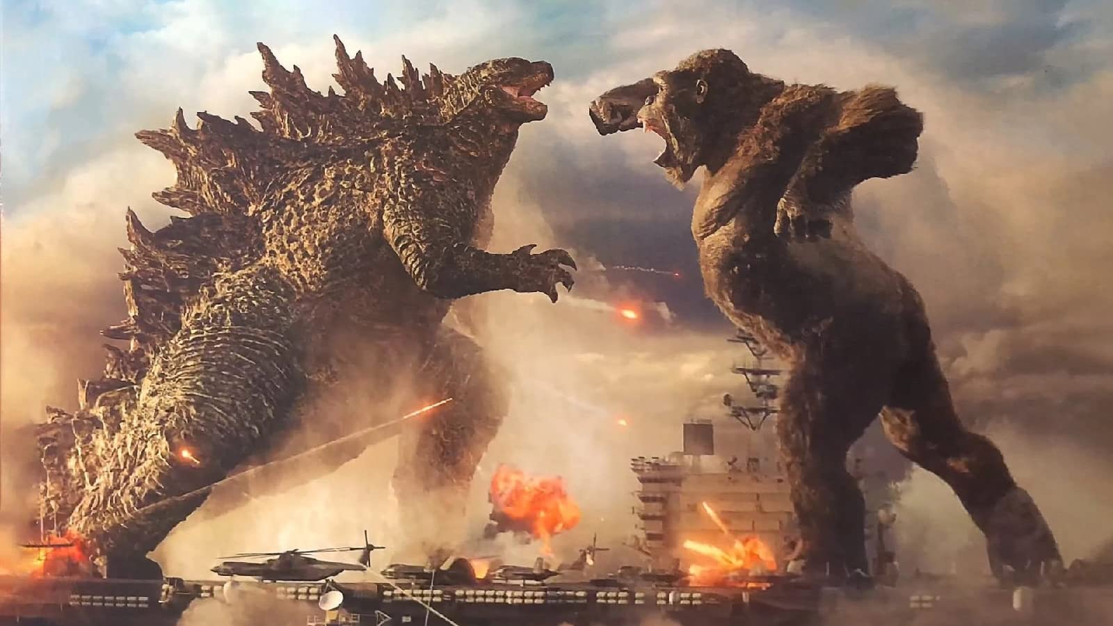 A screenshot from Godzilla vs Kong showing the two titans fighting on an aircraft carrier.
