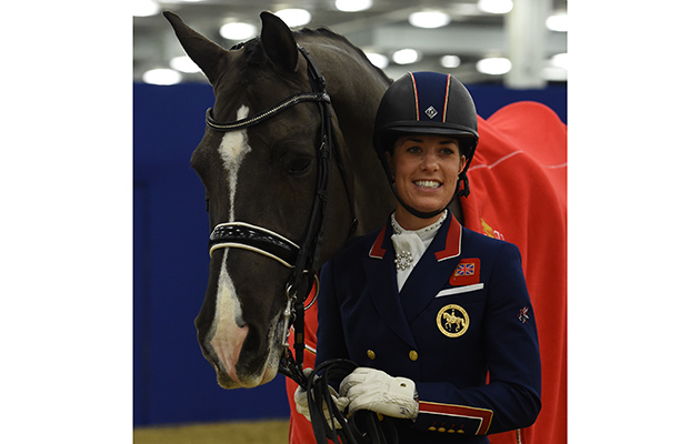 Charlotte and Valegro pose backstage for the media after their display