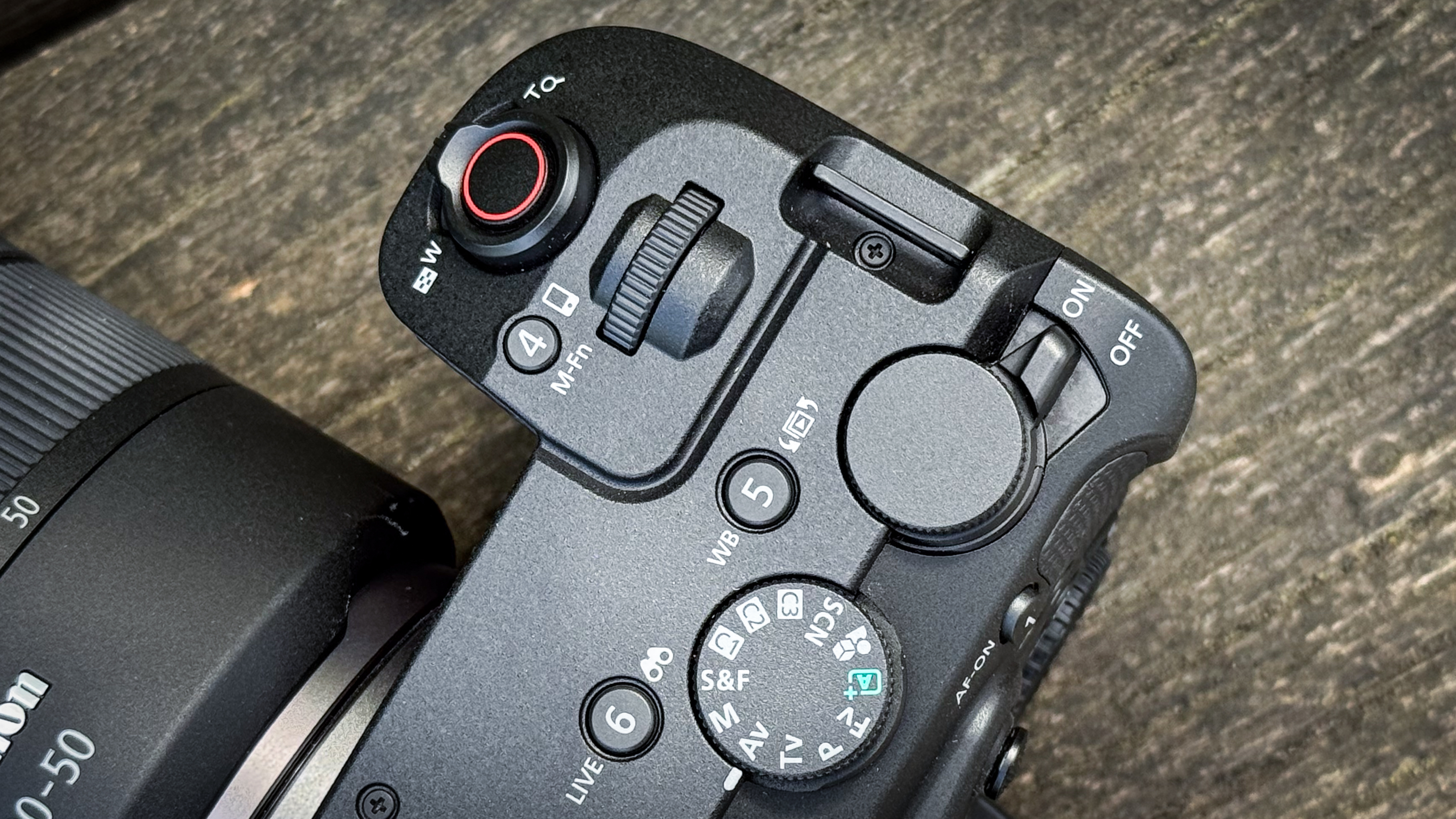 Canon EOS R6 V on a wooden surface