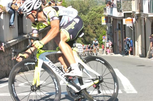Gatto being chased by Contador and the bunch