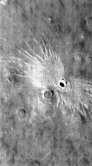 The ejecta pattern on this Martian butterfly crater formed as blown-off material created two "forbidden zones" in front of and behind the crater in which nothing fell back to the surface. The resulting debris left a butterfly pattern.