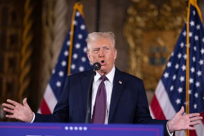 U.S. President-elect Donald Trump speaks to members of the media during a press conference