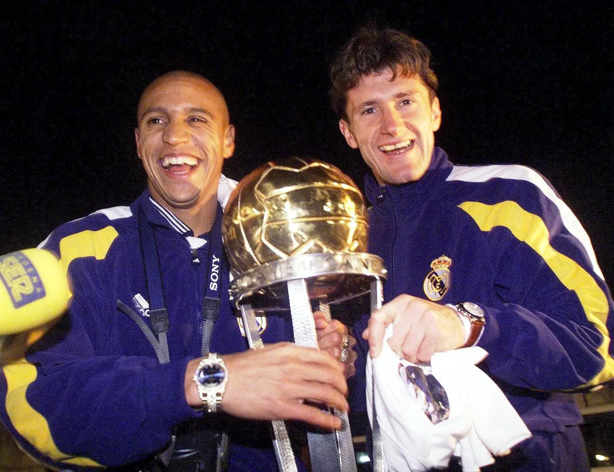 Real Madrid pair Roberto Carlos and Davor Suker with the Intercontinental Cup in 1998.