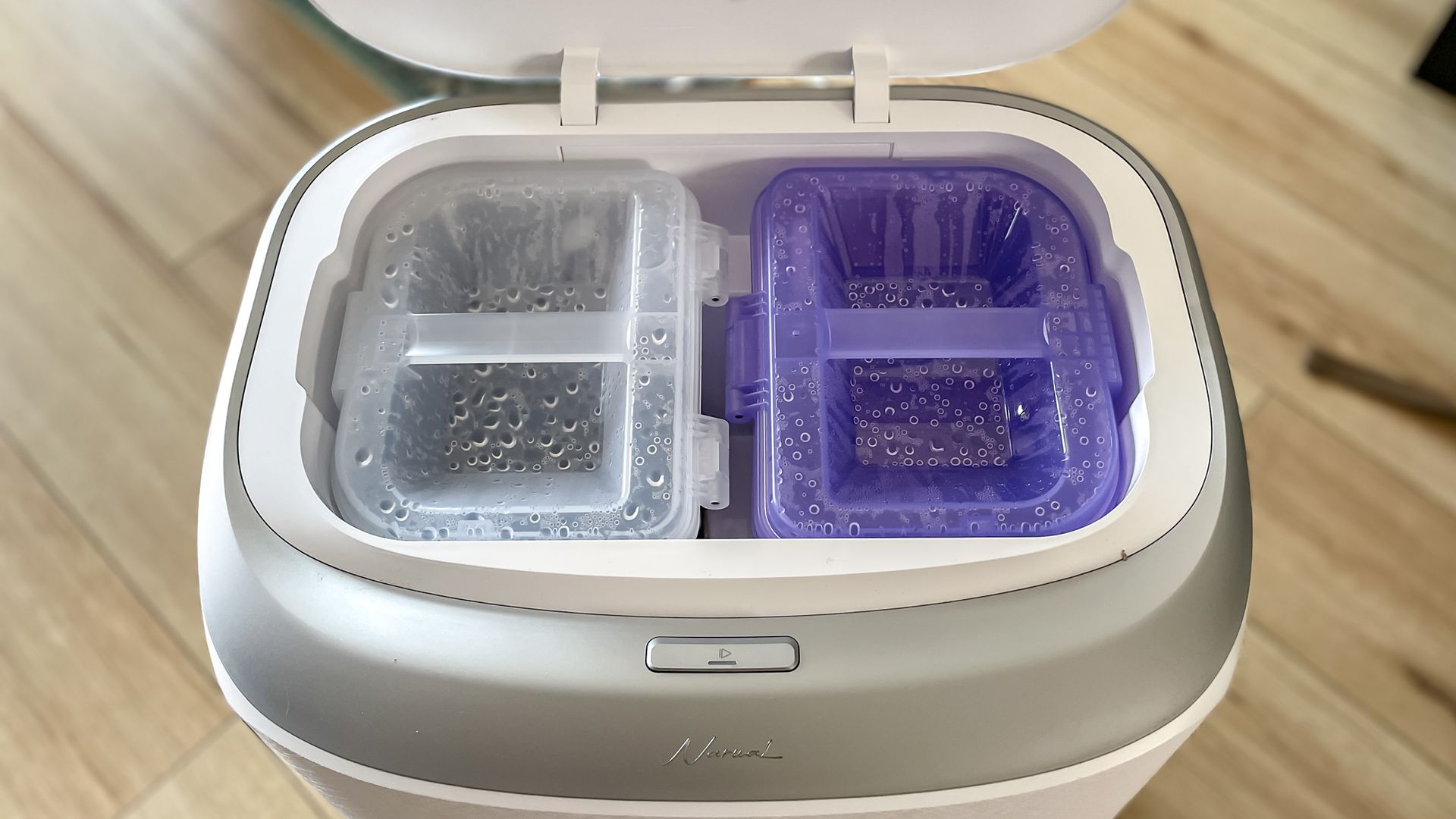 The tanks in the Narwal Freo 20 robot vacuum dock