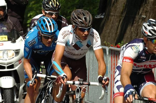 The breakaway riders pushing hard