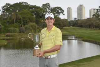Nico Echavarria poses with the 2018 Sao Paulo Golf Club Championship trophy