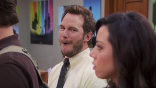 Andy Dwyer looking at April in Parks and Rec