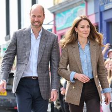 TOBERMORY, SCOTLAND - APRIL 29: Prince William, Prince of Wales, known as the Duke of Rothesay and Catherine, Princess of Wales, known as the Duchess of Rothesay when in Scotland, smile to well-wishers as they arrive for a visit to Aros Hall, a local community hub on April 29, 2025 in Tobermory, Scotland. The Prince and Princess of Wales are on a two-day visit to the Isles of Mull and Iona on the 29th and 30th of April to engage with rural island communities. During their time on the islands, they will connect with local residents, highlighting the value of social bonds and underscoring the importance of safeguarding and advocating for the natural environment. (Photo by Chris Jackson/Getty Images)