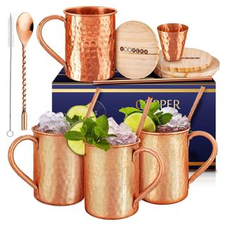 A set of hammered copper mugs