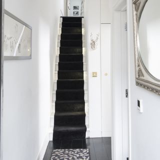 black stairway carpet