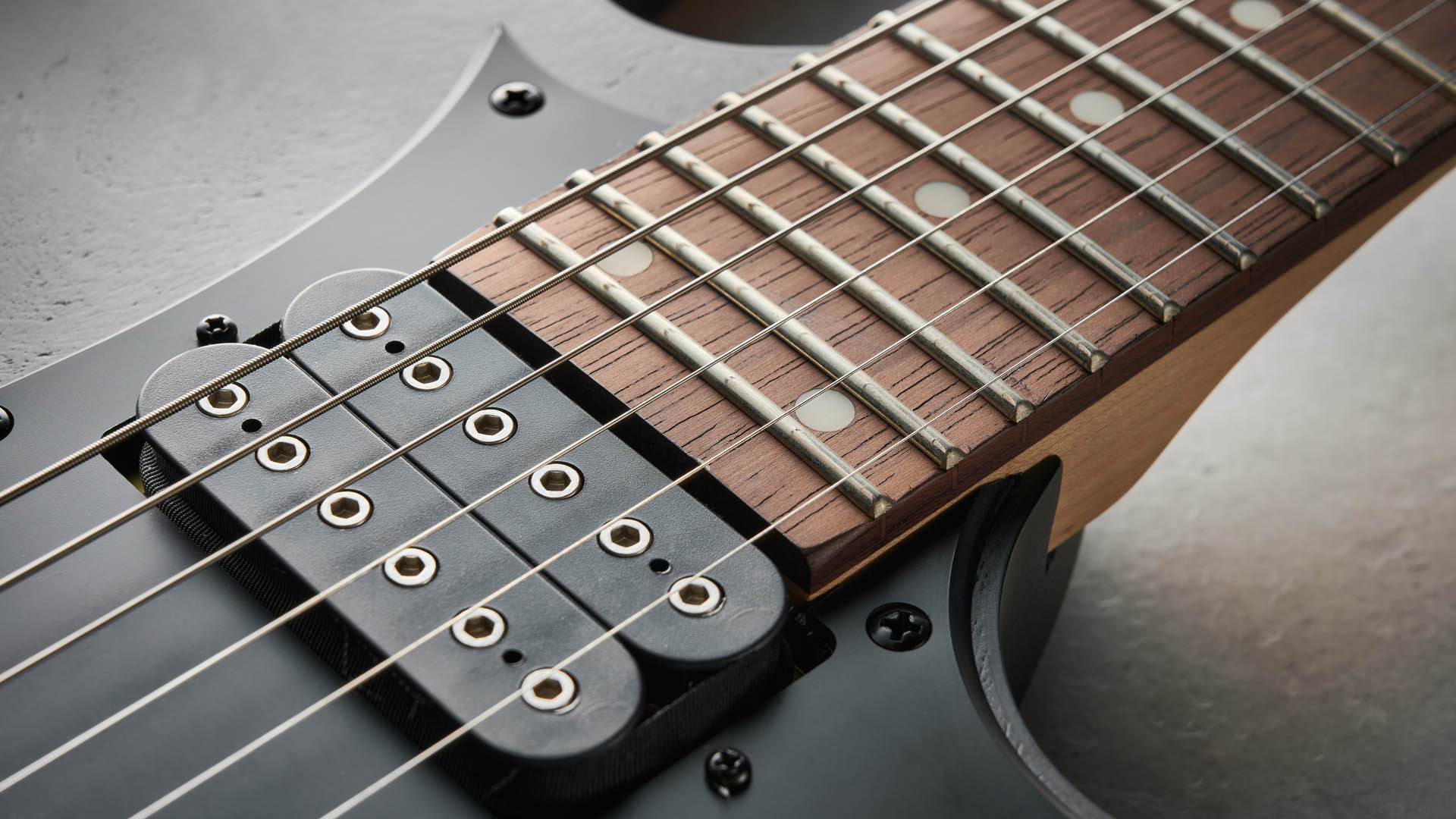 The Ibanez Standard Series RGR431PB finished in Charcoal Gray Flat