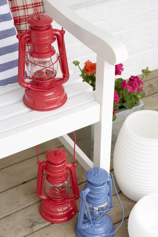 colorful lanterns on a white bench
