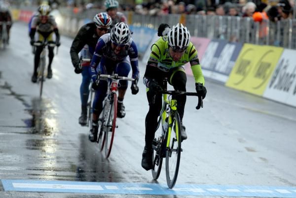 Riders clamber for wheels in the mucky conditions