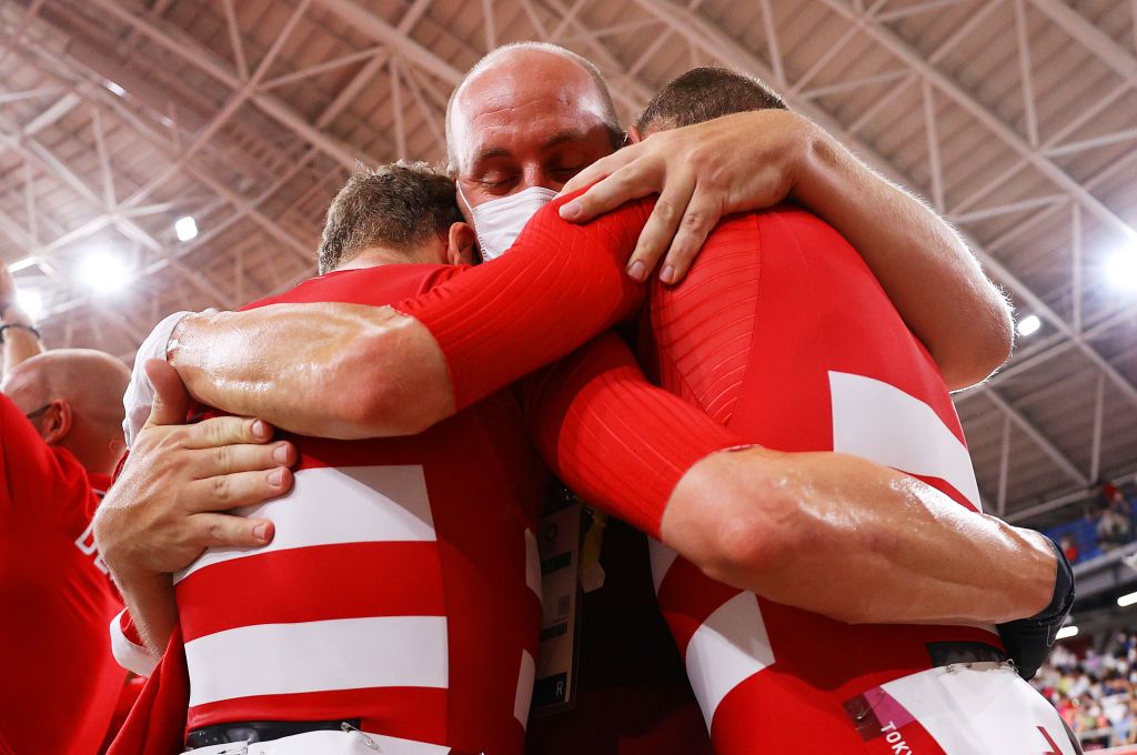 Lasse Norman Hansen and Michael Morkov get a hug after winning the men's Madison gold medal