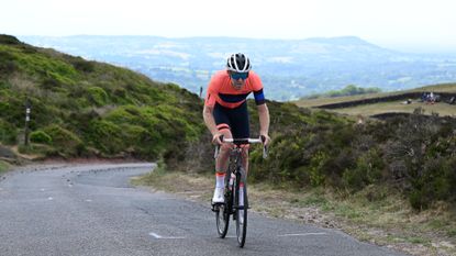 Male cyclist riding in Zone 3