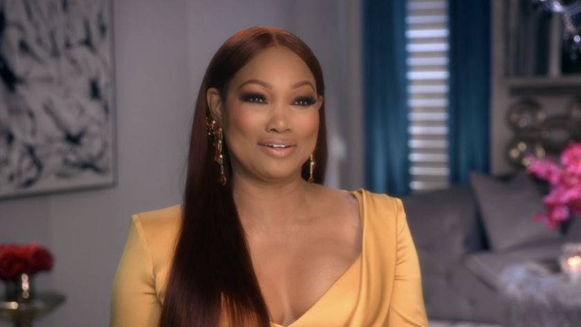 Garcelle smiling in a confessional for Season 14 of RHOBH