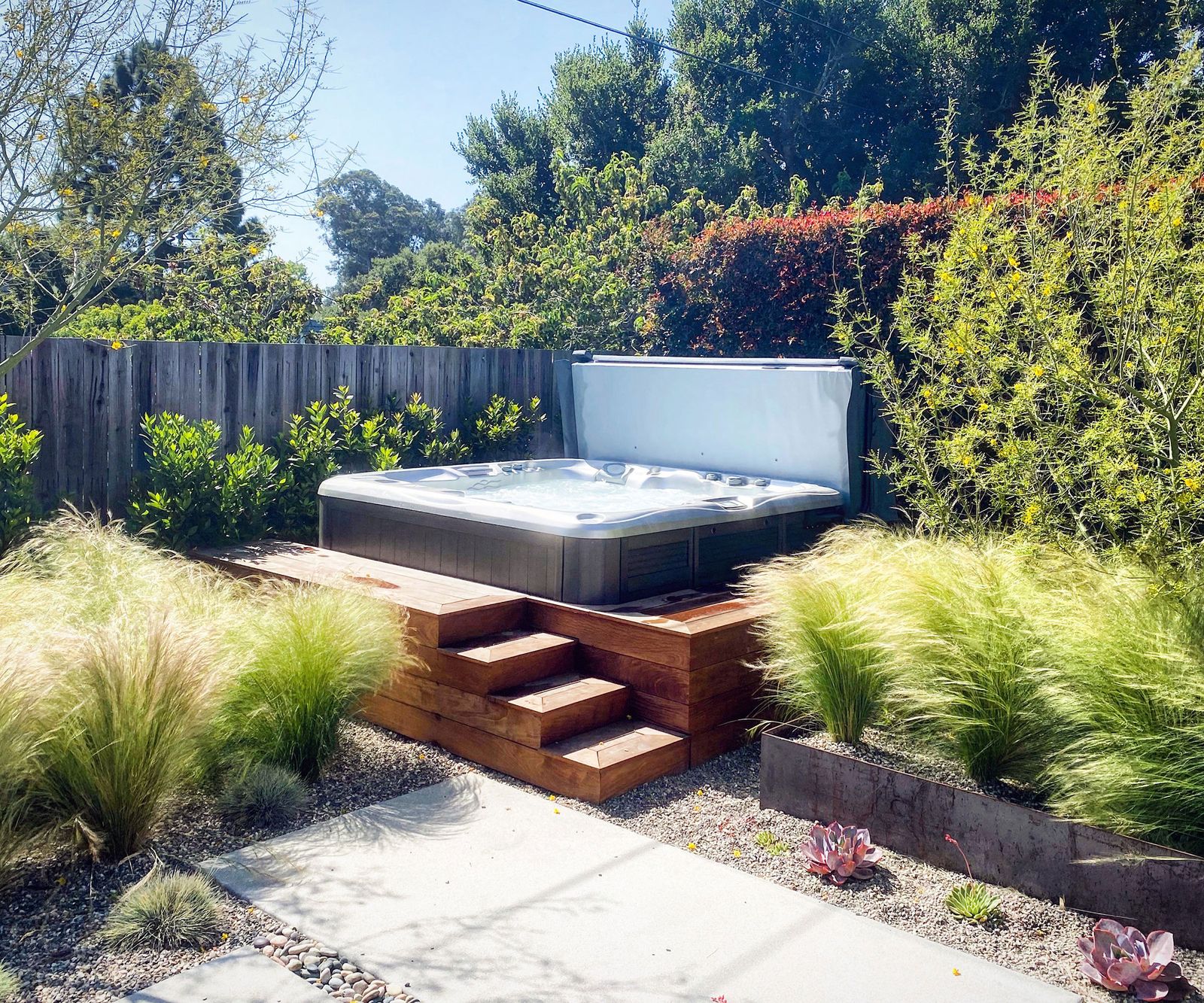 Backyard hot tub ideas 11 ways to include an outdoor spa Homes & Gardens