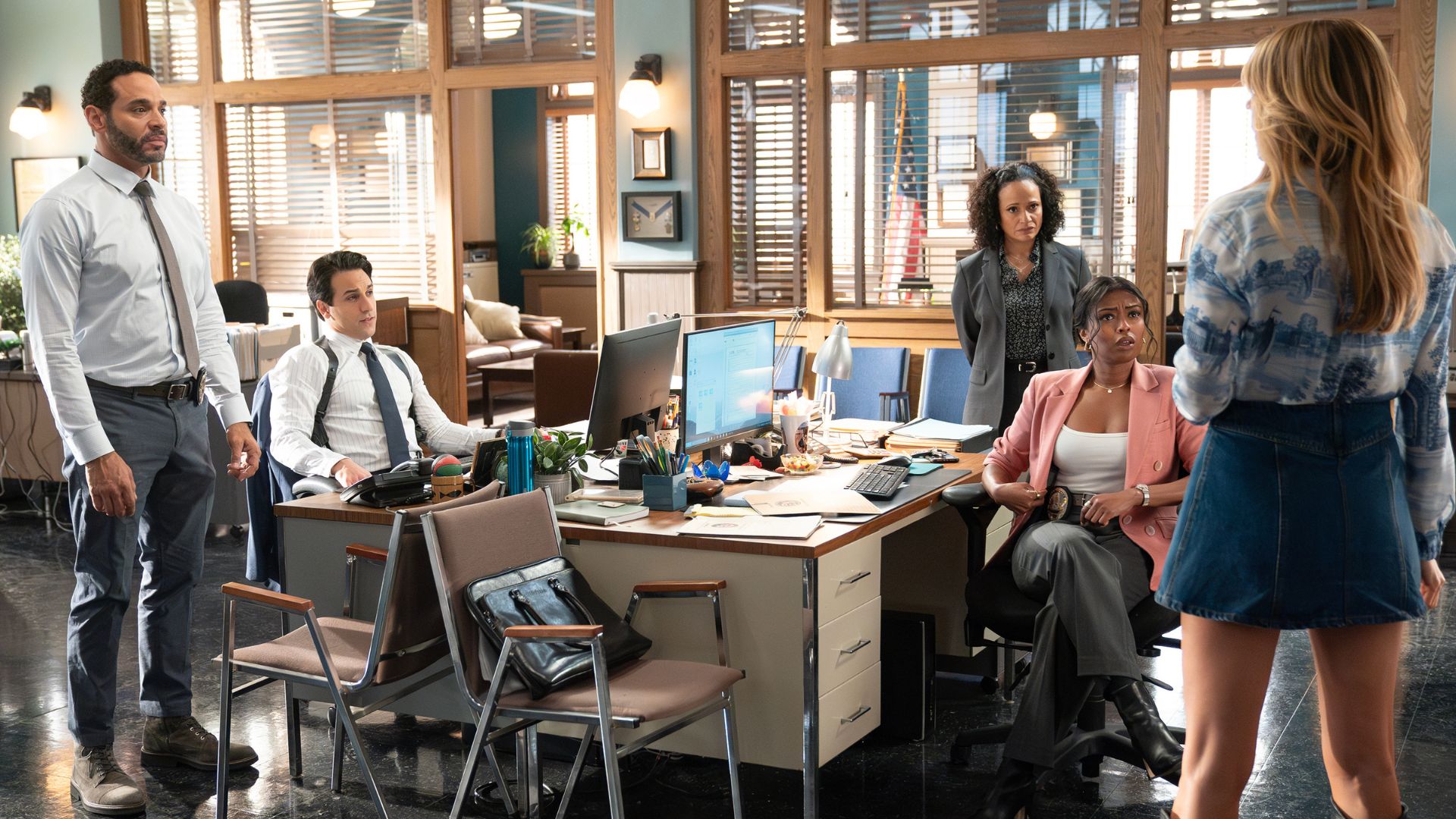 an image of the team in high potential mid scene during an investigation