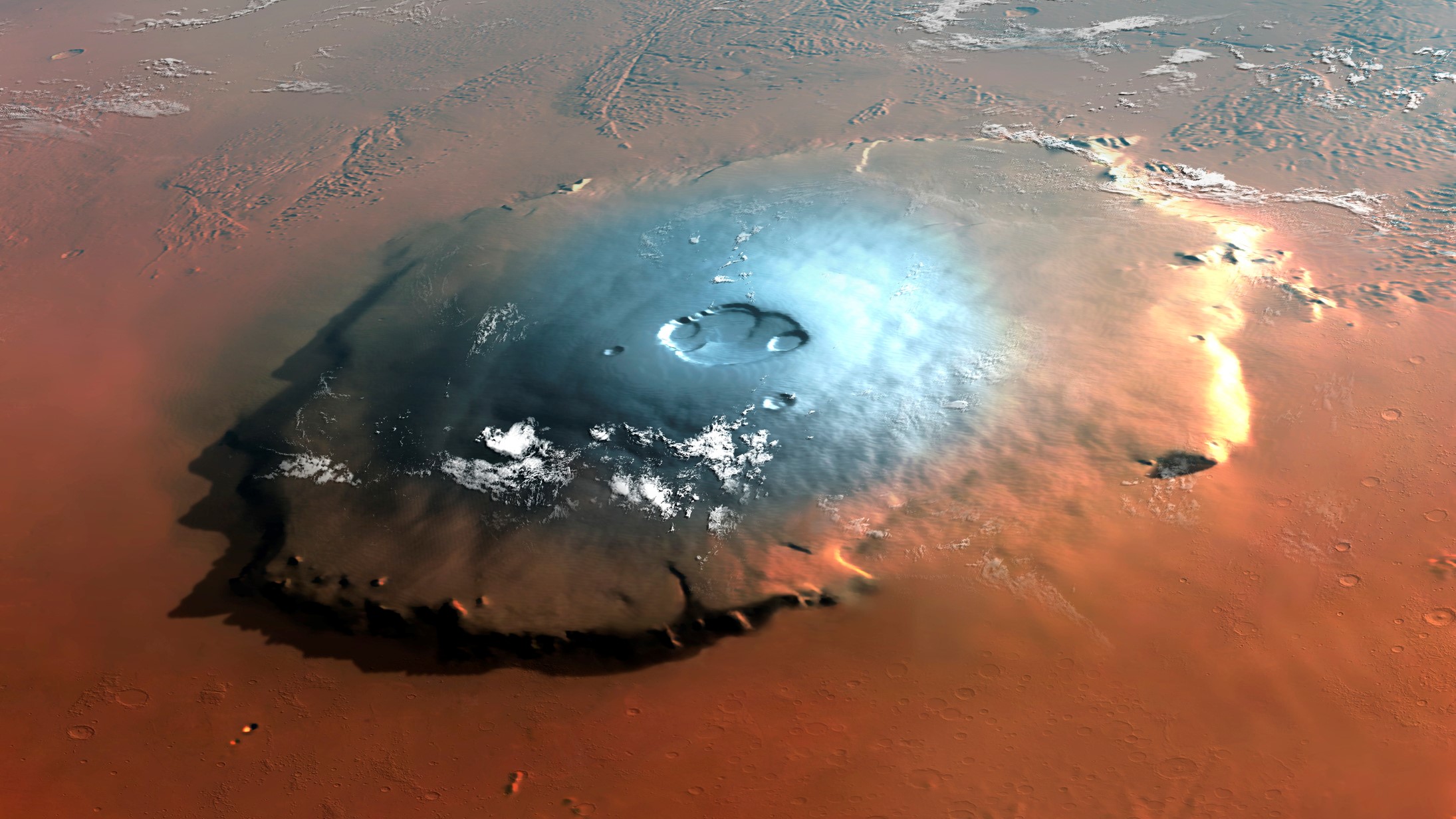 Olympus mons is the biggest volcano ever discovered in the solar system. This artist’s illustration depicts what the shield volcano looks like on Mars.