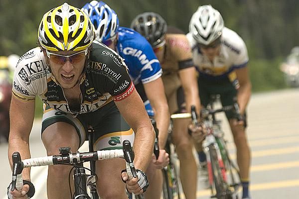 Daniel Bowman (Kelly Benefit Strategies) from the USA drives a leading quartet towards the outskirts of Kuala Lumpur on the final stage.