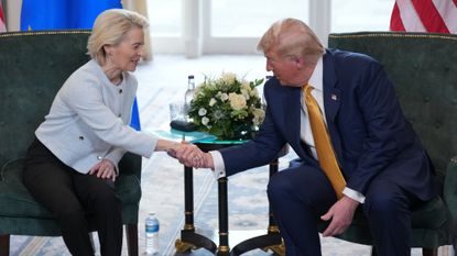 President of the European Commission Ursula von der Leyen shakes hands with U.S. President Donald Trump during a meeting at Trump Turnberry golf club