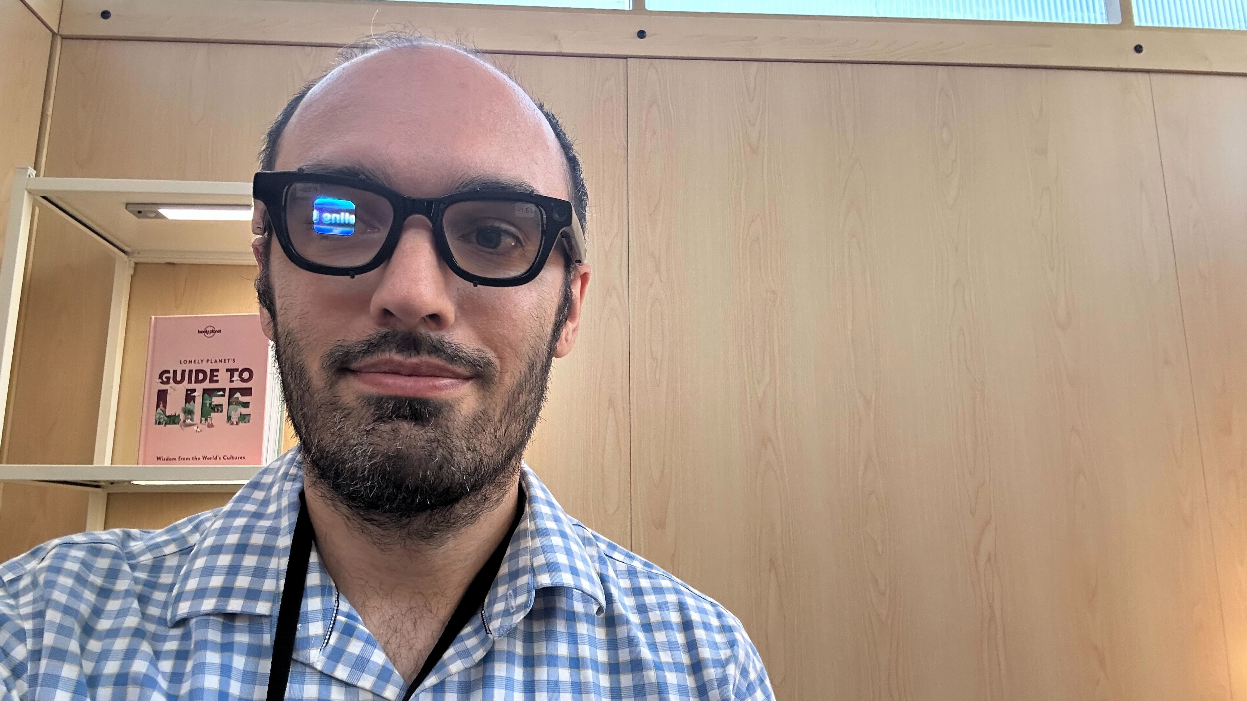 Michael Hicks wearing Android XR prototype glasses