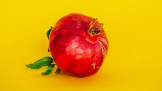 Whole pomegranate with skin on