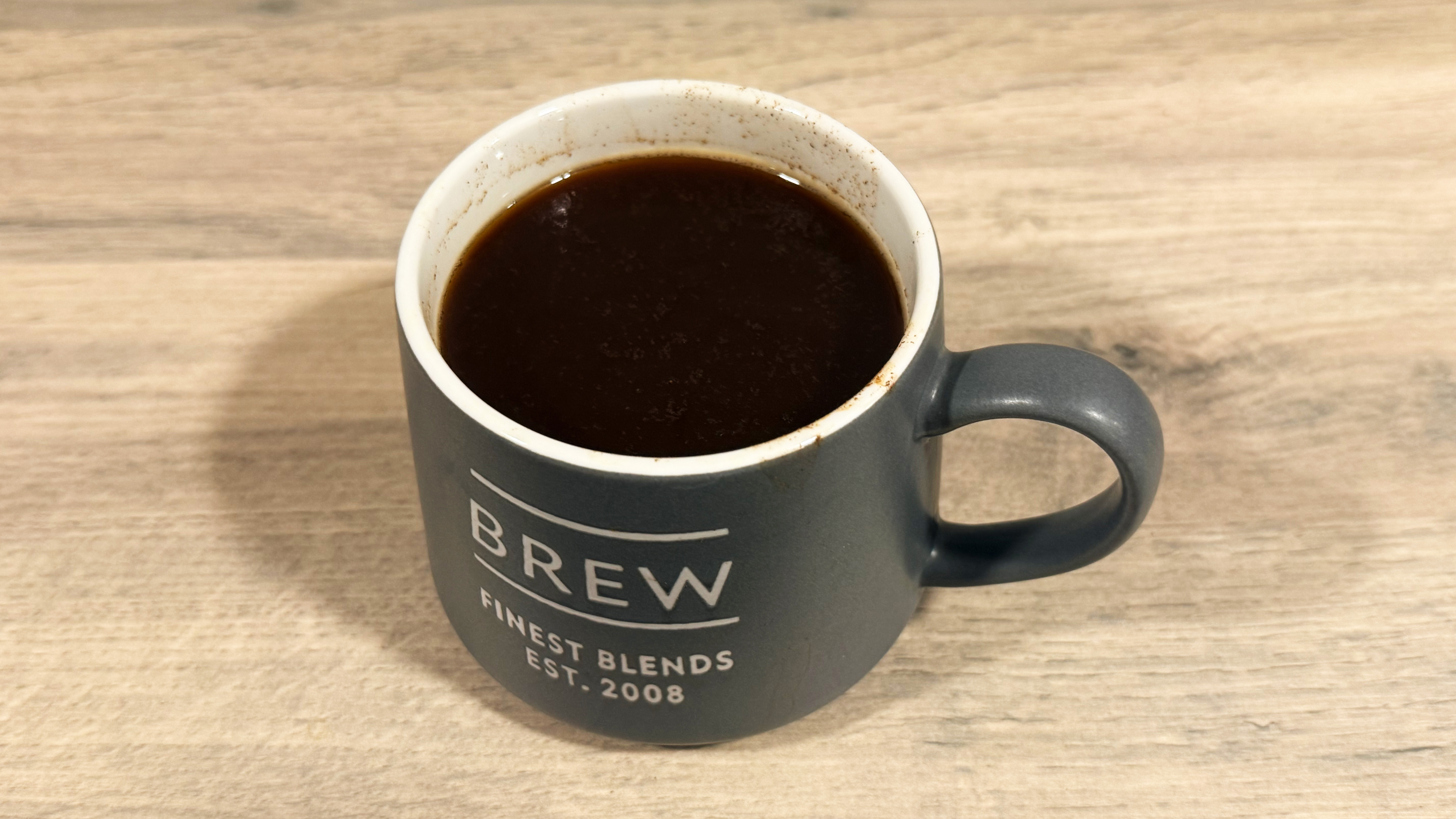 a photo of a black coffee made on the stanley perfect brew pour over coffee maker
