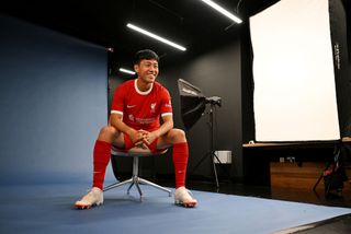 Wataru Endo new signing of Liverpool at AXA Training Centre on August 18, 2023 in Kirkby, England.