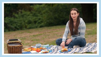 Yael Yurman as Marah in Netflix's Firefly Lane season 2; pictured having a picnic