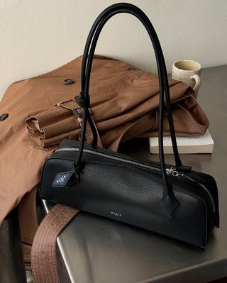 French Outfit Updates: @salome.mory showcases an east/west bag