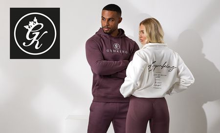 gym king logo top left with two people posing in gym attire