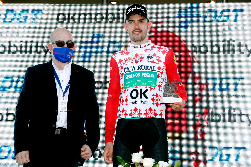 ALCALA LA REAL SPAIN FEBRUARY 17 Jon Barrenetxea Golzarri of Spain and Team Caja RuralAlea celebrates at podium as Red Mountain Jersey winner after the 68th Vuelta A Andalucia Ruta Del Sol 2022 Stage 2 a 1506km stage from Archidona to Alcal La Real 982m 68RdS on February 17 2022 in Alcala la Real Spain Photo by Bas CzerwinskiGetty Images
