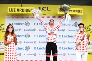 LUZ ARDIDEN FRANCE JULY 15 Tadej Pogaar of Slovenia and UAETeam Emirates Polka Dot Mountain Jersey celebrates at podium during the 108th Tour de France 2021 Stage 18 a 1297km stage from Pau to Luz Ardiden 1715m LeTour TDF2021 on July 15 2021 in Luz Ardiden France Photo by Michael SteeleGetty Images