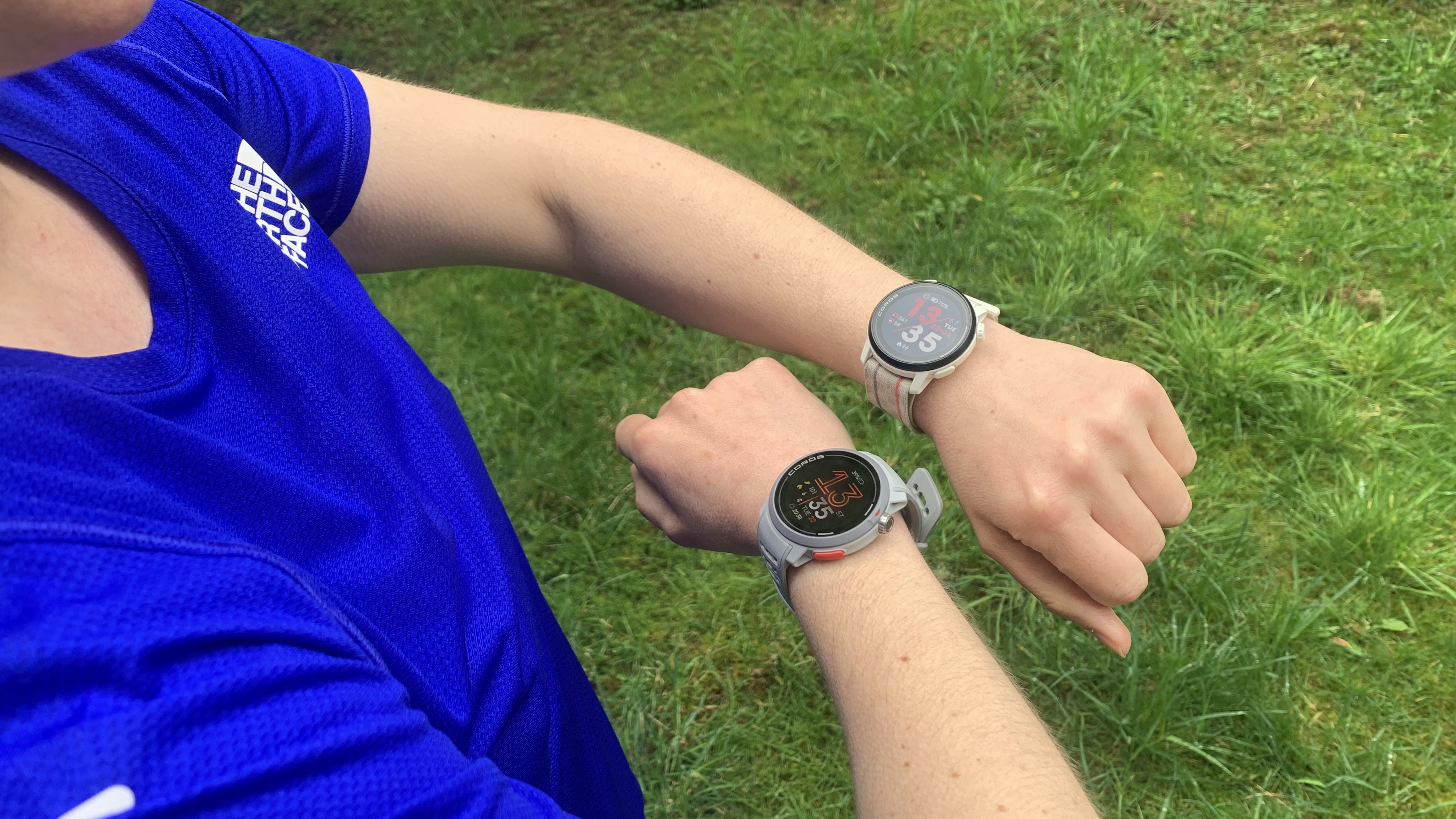 A runner's wrists wearing the Coros Pace Pro and Coros Pace 3